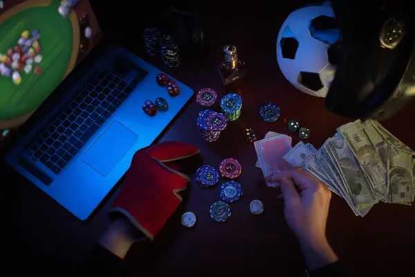 ZS777 Live Games — Take part in high-energy casino action A glowing roulette wheel with cascading chips, symbolizing the engaging live and instant-win games available on ZS777.